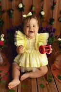 Baby photo shoot with flowers